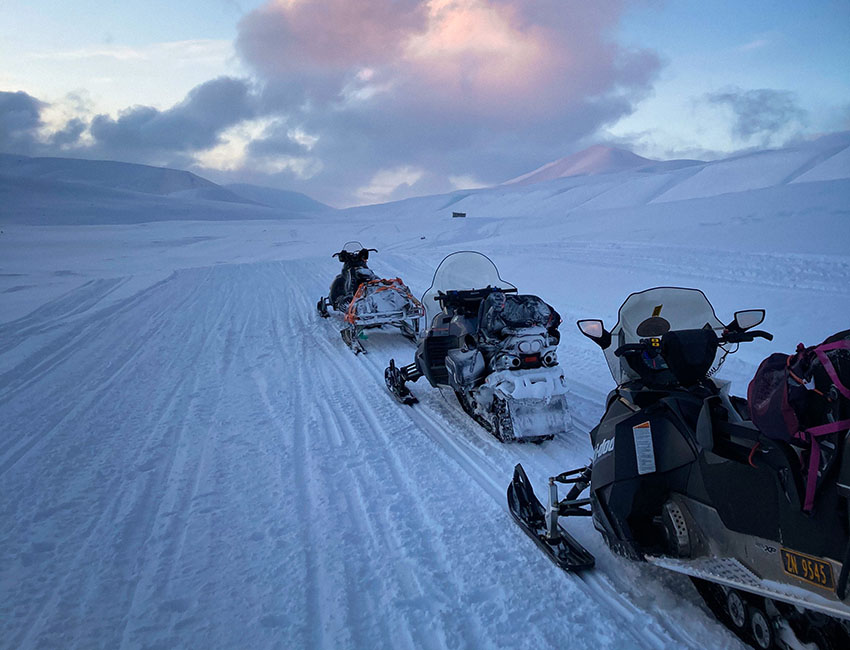 Snowmobile driving on Svalbard
